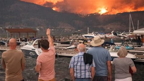 Destructive West Kelowna, B.C., wildfire now considered ‘held’